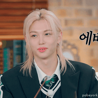 Blonde Man In Suit Holding Wand GIF
