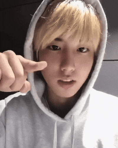Blonde Man In White Hoodie Making Heart With Fingers GIF