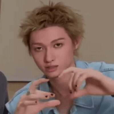 Blonde Man Making Heart Shape With Hands GIF