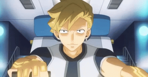 Blonde Man Sitting In Chair With Fist In The Air GIF