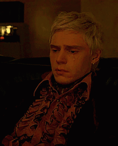 Blonde Man Sitting On Couch Crying GIF