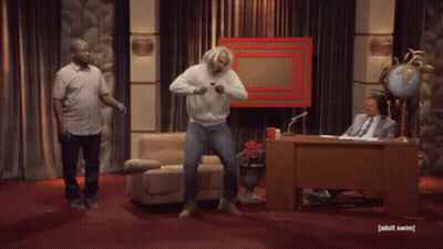 Blonde Man Standing In Front Of Globe GIF