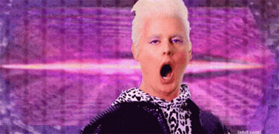 Blonde Man Yawning In Leopard Scarf GIF