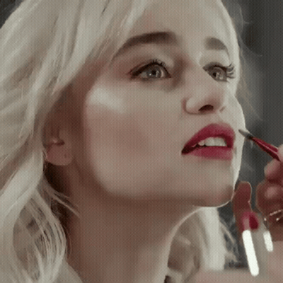 Blonde Woman Applying Red Lipstick GIF