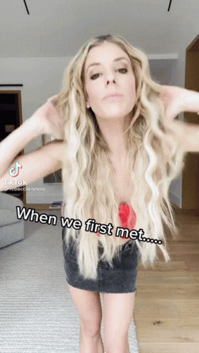 Blonde Woman Arms Outstretched Saying When We First Met GIF