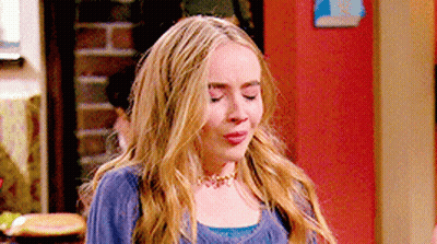 Blonde Woman Blue Sweater & Choker GIF
