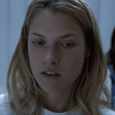 Blonde Woman Close Up In White Shirt GIF