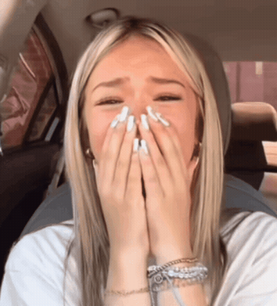 Blonde Woman Covering Face With Hands GIF