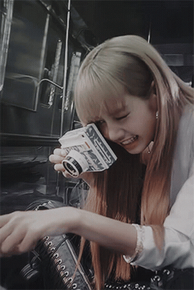 Blonde Woman Holding Polaroid Camera Smiling GIF