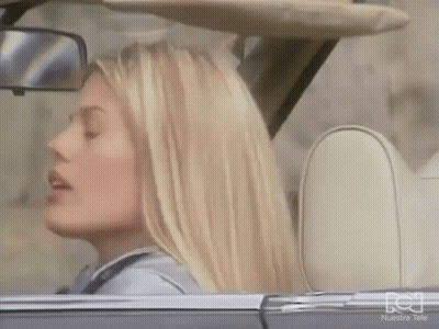Blonde Woman In Back Seat Of Convertible GIF