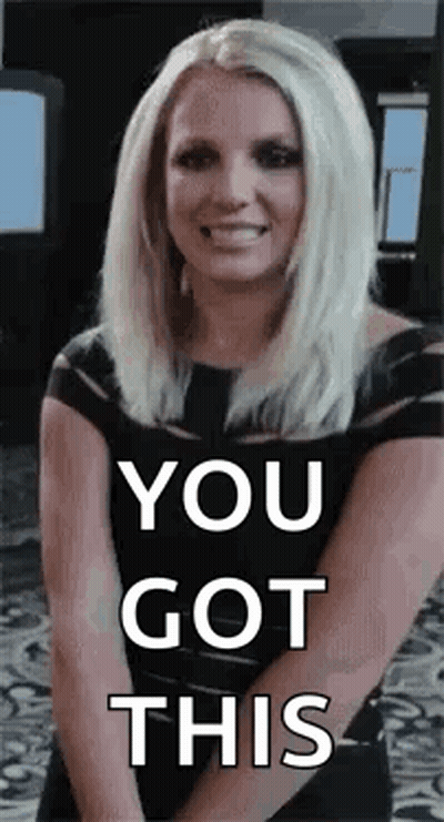 Blonde Woman In Black Dress Smiling Hands Together GIF