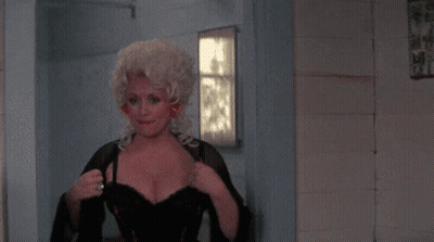 Blonde Woman In Black Dress With Red Nails GIF