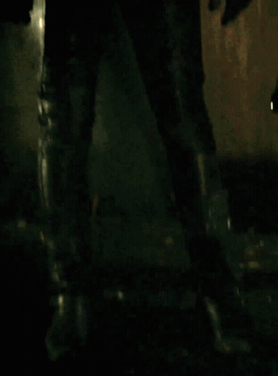 Blonde Woman In Black Mask And Leather Jacket GIF