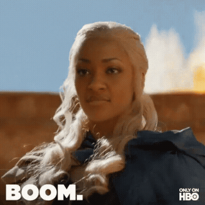 Blonde Woman In Blue Cape Saying Boom GIF