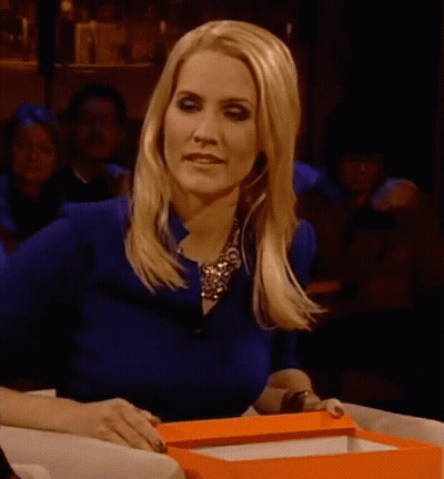 Blonde Woman In Blue Shirt And Necklace GIF