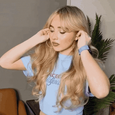 Blonde Woman in Blue Shirt Saying Cancel All Your Plans
