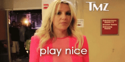 Blonde Woman In Pink Shirt Says Play Nice GIF