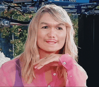 Blonde Woman In Pink Shirt With Fake Mustache GIF