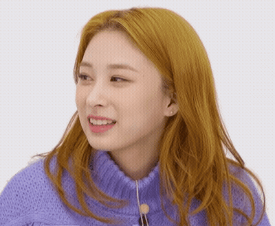 Blonde Woman In Purple Sweater Smiling GIF