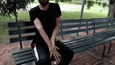 Blonde Woman In Red Lips Facing Crowd GIF