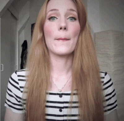Blonde Woman In Striped Shirt With Necklace GIF