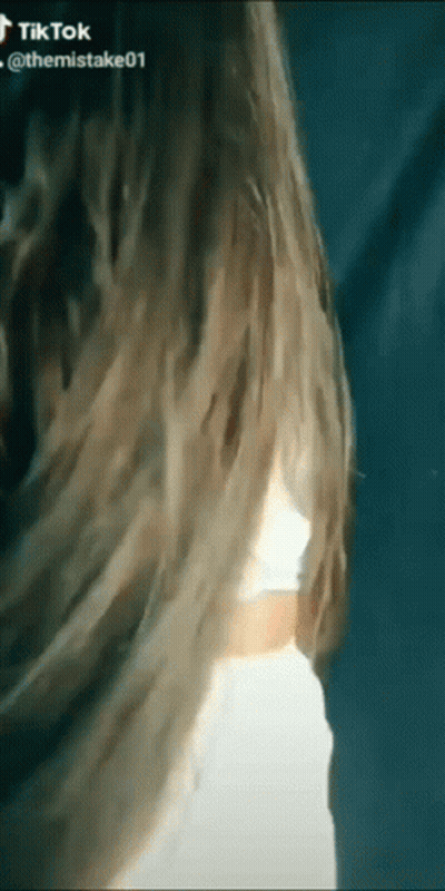 Blonde Woman In White Crop Top And Skirt GIF