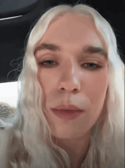 Blonde Woman Looking At Camera GIF