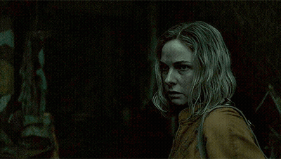 Blonde Woman Looking At Camera GIF