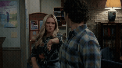 Blonde Woman Making Funny Face In Front Of A Girl Poster GIF