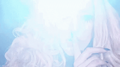 Blonde Woman Shushing With Finger GIF