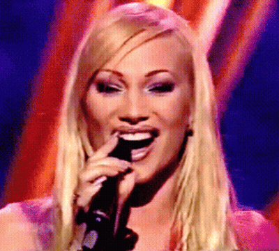 Blonde Woman Singing And Smiling GIF