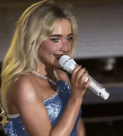 Blonde Woman Singing In Blue Dress GIF