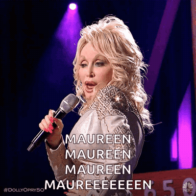 Blonde Woman Singing Maureen Maureen Maureen Into Microphone GIF