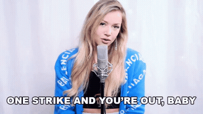 Blonde Woman Singing One Strike And You're Out Baby GIF