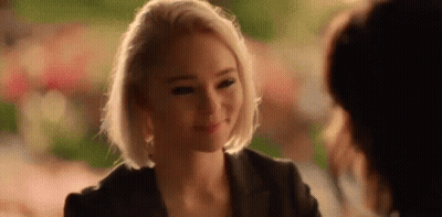 Blonde Woman Smiling At Another Woman GIF