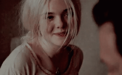 Blonde Woman Smiling At Camera GIF