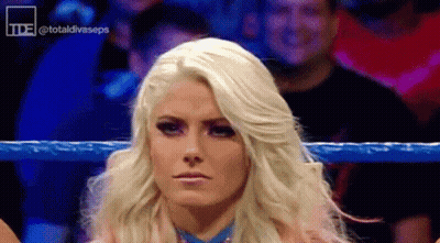 Blonde Woman Standing In Wrestling Ring With Crowd GIF