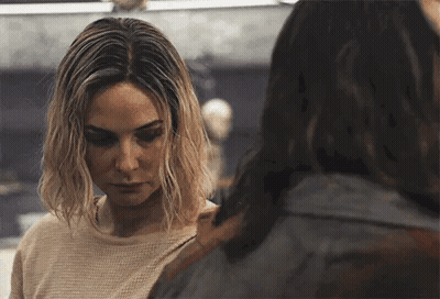 Blonde Woman Standing Next To Long-Haired Woman GIF