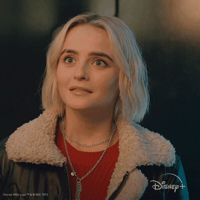 Blonde Woman Wearing Disney+ Ad GIF