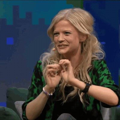 Blonde Woman Wearing Green Shirt And Ikea Watch GIF
