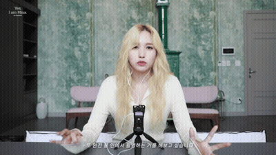 Blonde Woman Wearing Headphones And Microphone Says Yes I Am Mina GIF