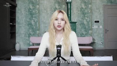 Blonde Woman Wearing Headphones Says Yes I Am Mina GIF