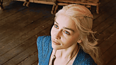 Blonde Woman With Blue Eyes In Blue Top GIF