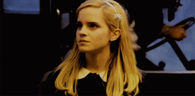 Blonde Woman With Flower In Hair GIF
