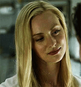 Blonde Woman With Freckles Looking At Camera GIF