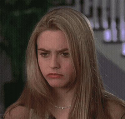 Blonde Woman With Pearl Necklace Making Funny Face GIF