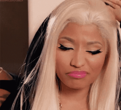 Blonde Woman With Pink Lipstick Making Sad Face GIF