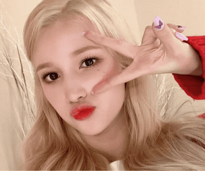 Blonde Woman With Red Lips And Purple Nails Making Peace Sign GIF