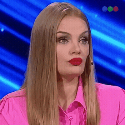 Blonde Woman With Red Lipstick And Pink Shirt GIF