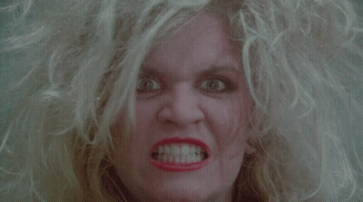 Blonde Woman With Red Lipstick Making Angry Face GIF